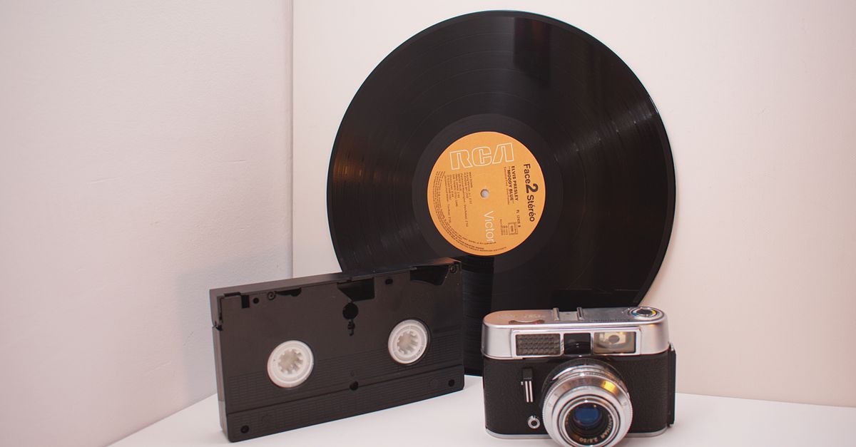 Retro technology enthusiasts will love this classic mix of vinyl record, analog camera, and VHS tape.